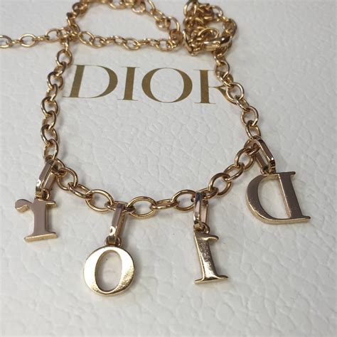 dior flower necklace price|dior letters necklace value.